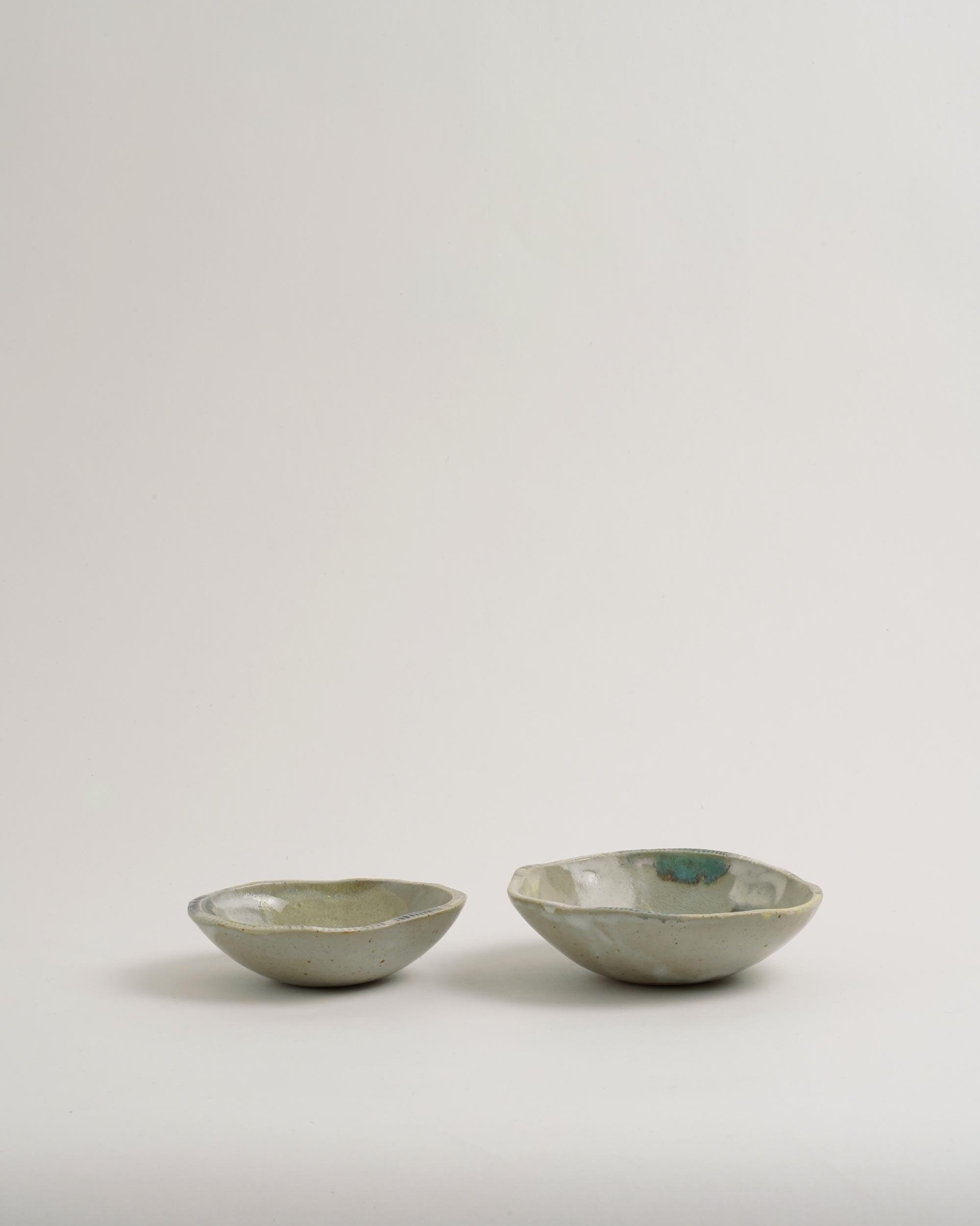 https://folkwayswines.com/cdn/shop/products/Folkways-Wines-Spirits-Rebecca-Sobotti-Nesting-Bowls-Set-Painted-Stoneware-Brookyn-Ceramics-01_2000x.jpg?v=1677801726